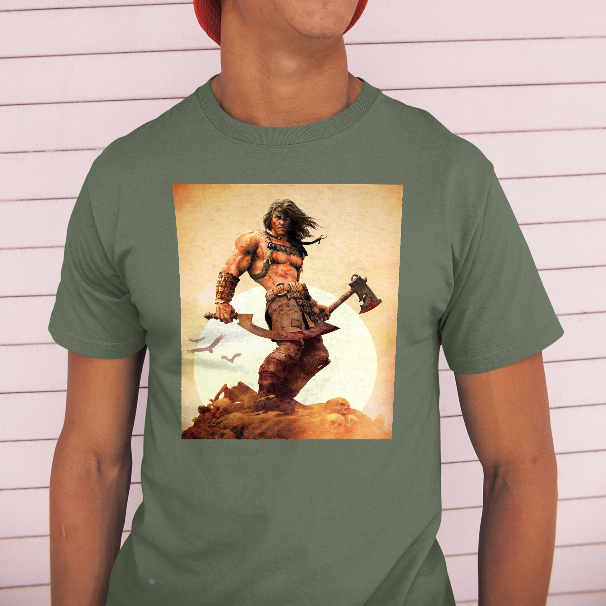 Age of Conan King Conan tee worn by a model in a cap, green
