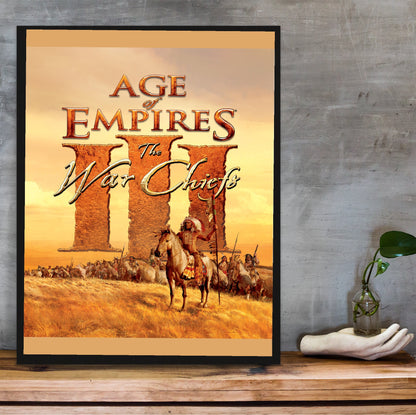 Age of Empires III The WarChiefs cover art in a black frame on a wooden shelf against concrete