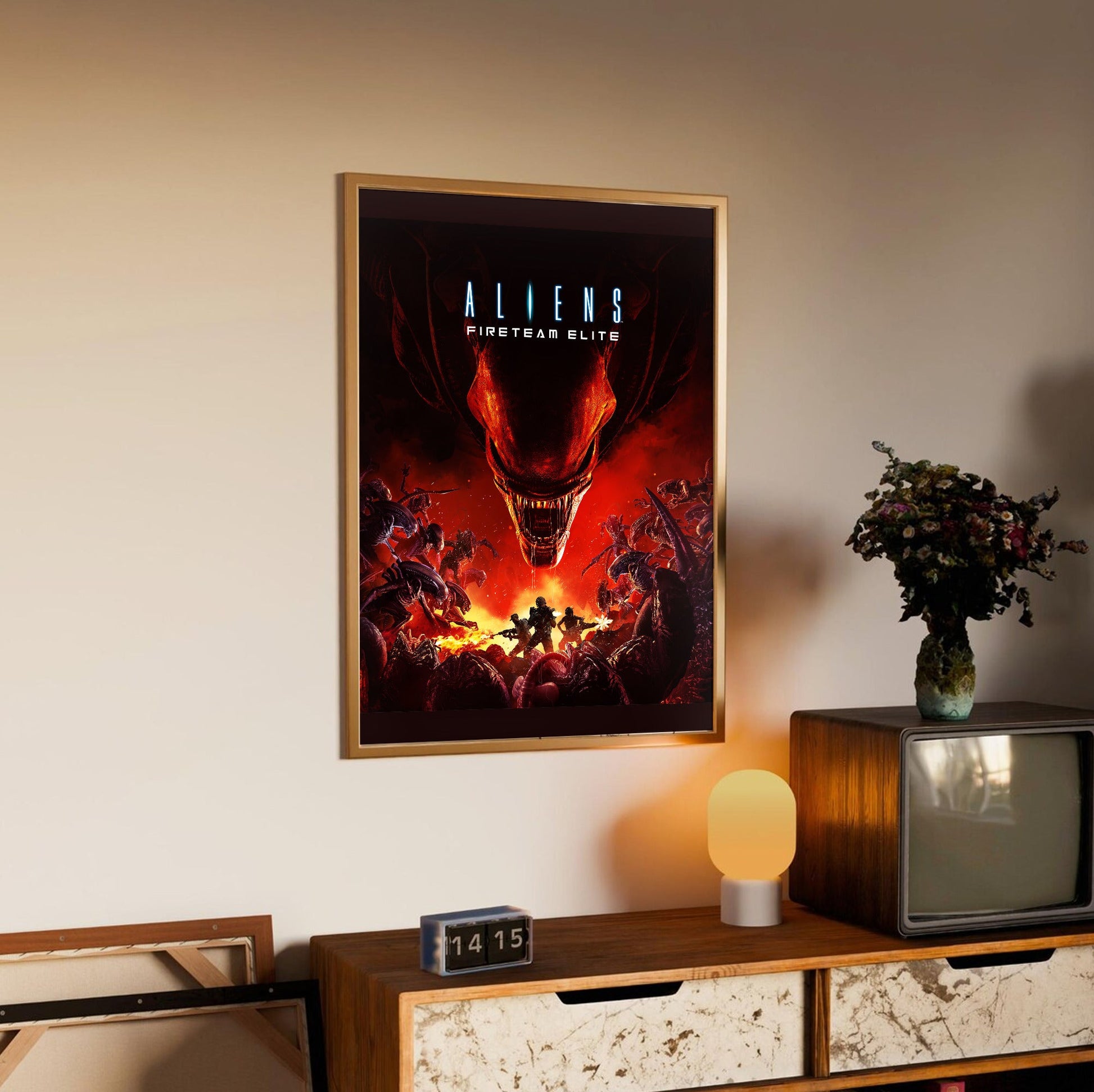 Aliens Fireteam Elite cover art in an oak frame above a sideboard