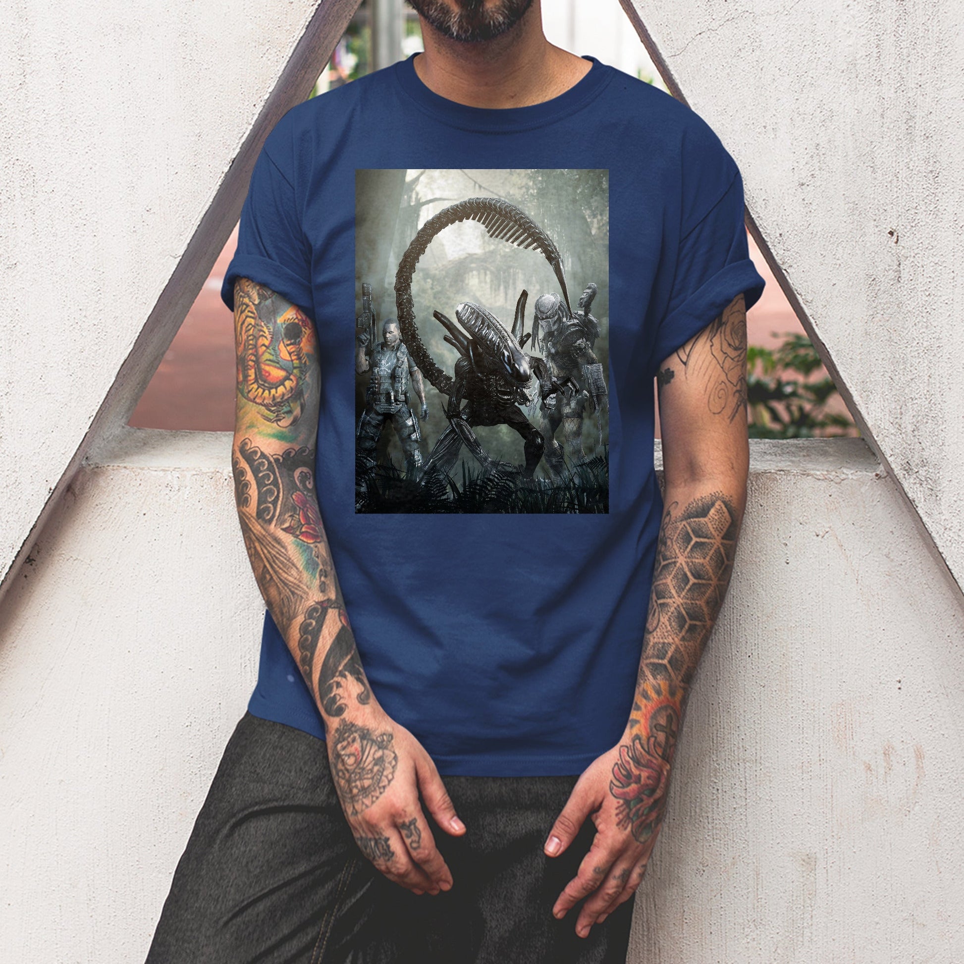 Aliens vs. Predator alien promo art tee worn by a model, navy