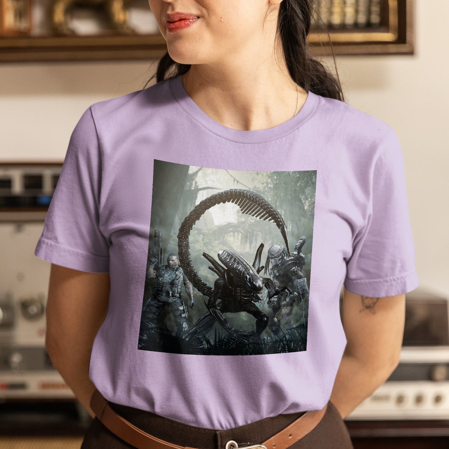 Aliens vs. Predator alien promo art tee worn by a model, violet