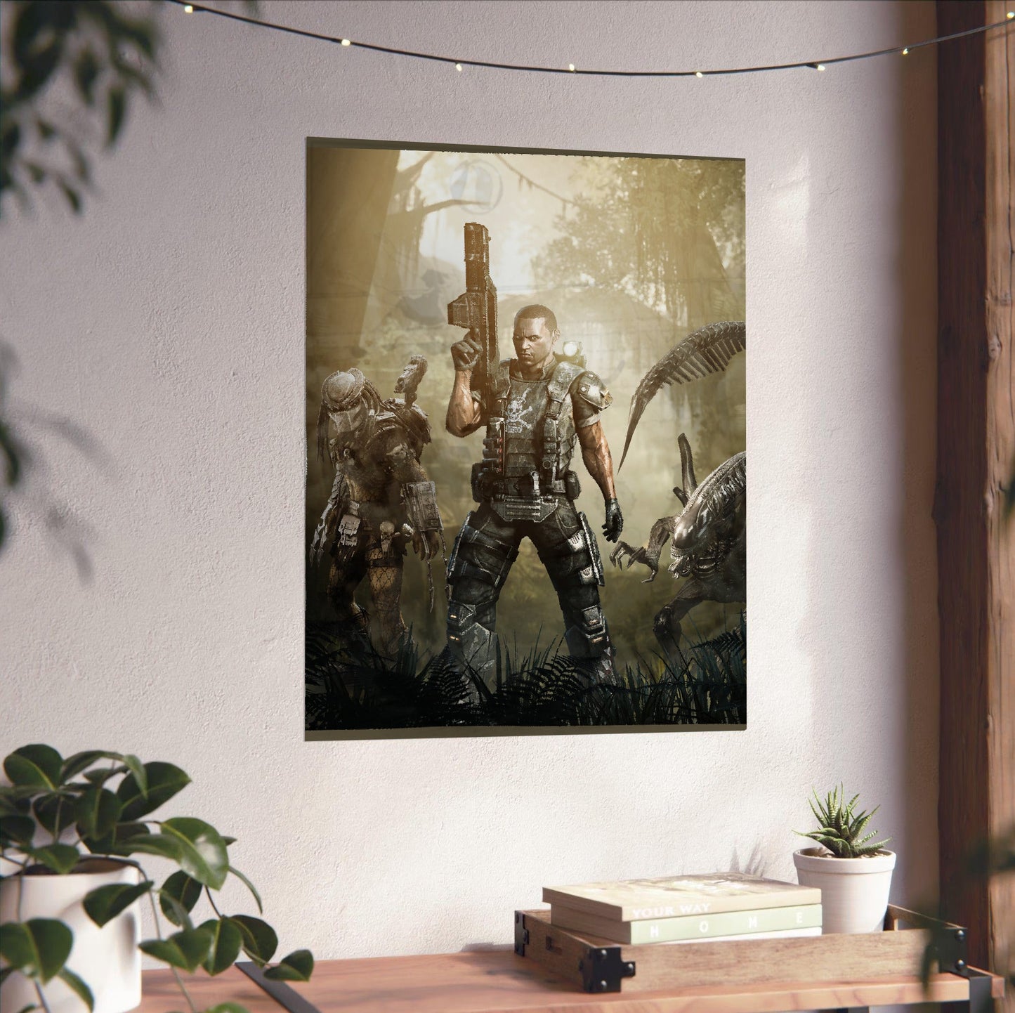 Aliens vs. Predator 2010 colonial marine promo art unframed on a white wall above a desk