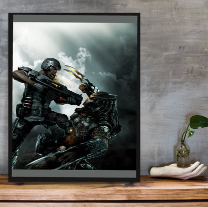 Aliens vs. Predator 2010 marketing art by Mike Man in a black frame on a wooden shelf against concrete