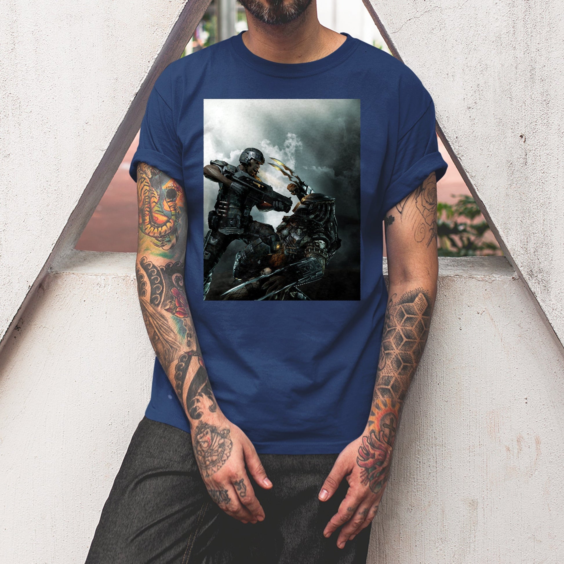 Aliens vs. Predator marketing art by Mike Man tee worn by a model, navy