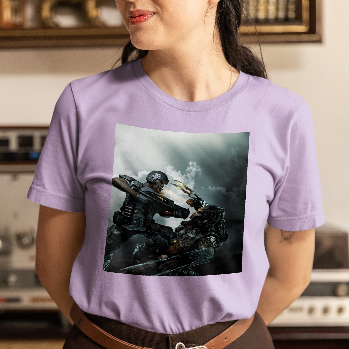 Aliens vs. Predator marketing art by Mike Man tee worn by a model, violet