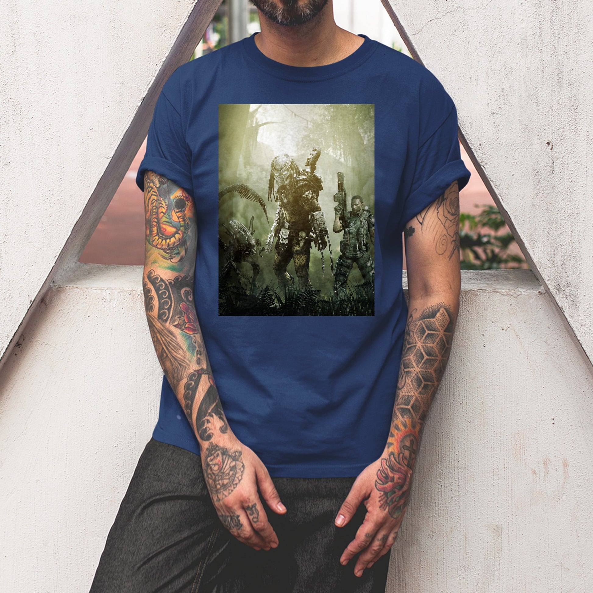 Aliens vs. Predator predator promo art tee worn by a model, navy