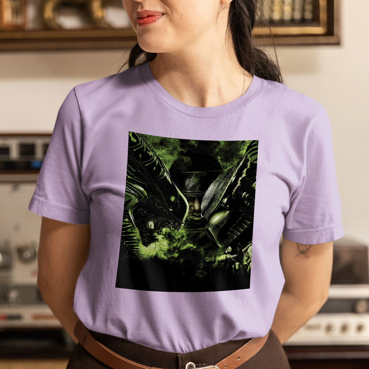 Aliens vs. Predator promotional art tee worn by a model, violet