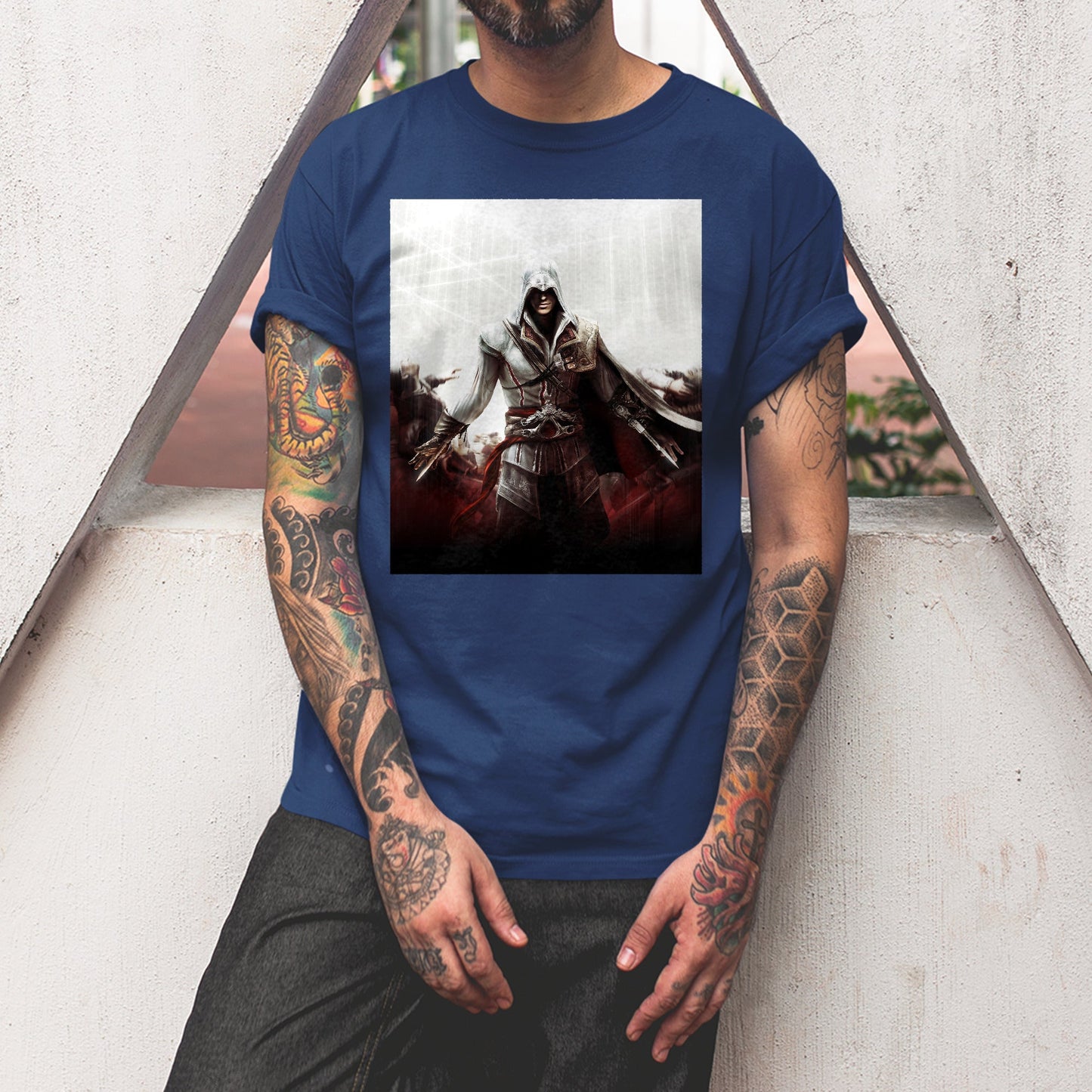 Assassin's Creed II cover art tee worn by a model, navy