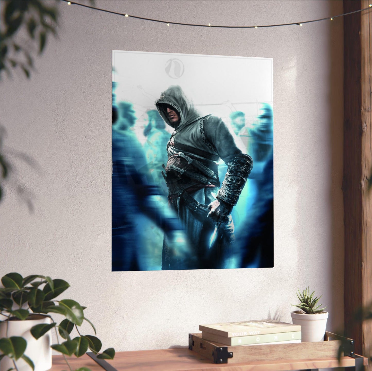 Assassin's Creed crowd key art unframed on a white wall above a desk