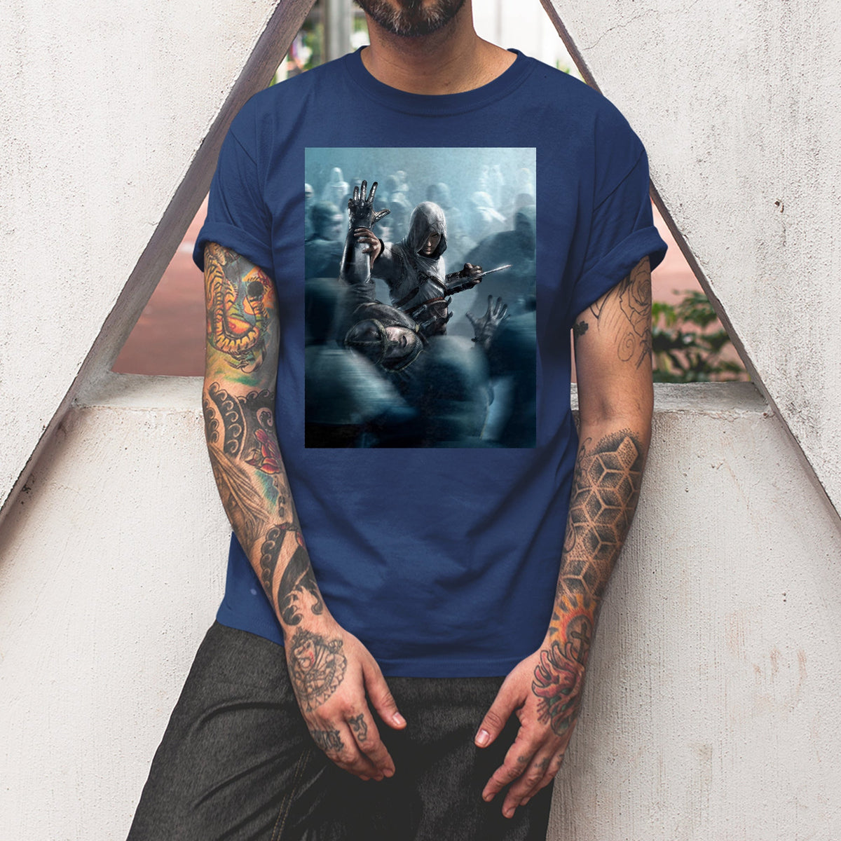 Assassin's Creed key visual tee worn by a model, navy