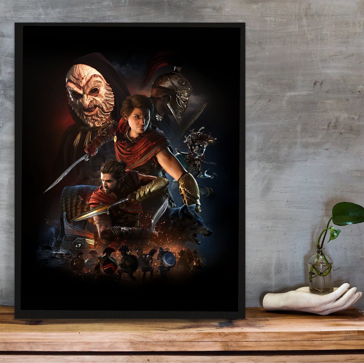 Assassin's Creed Odyssey promotional art in a black frame on a wooden shelf against concrete