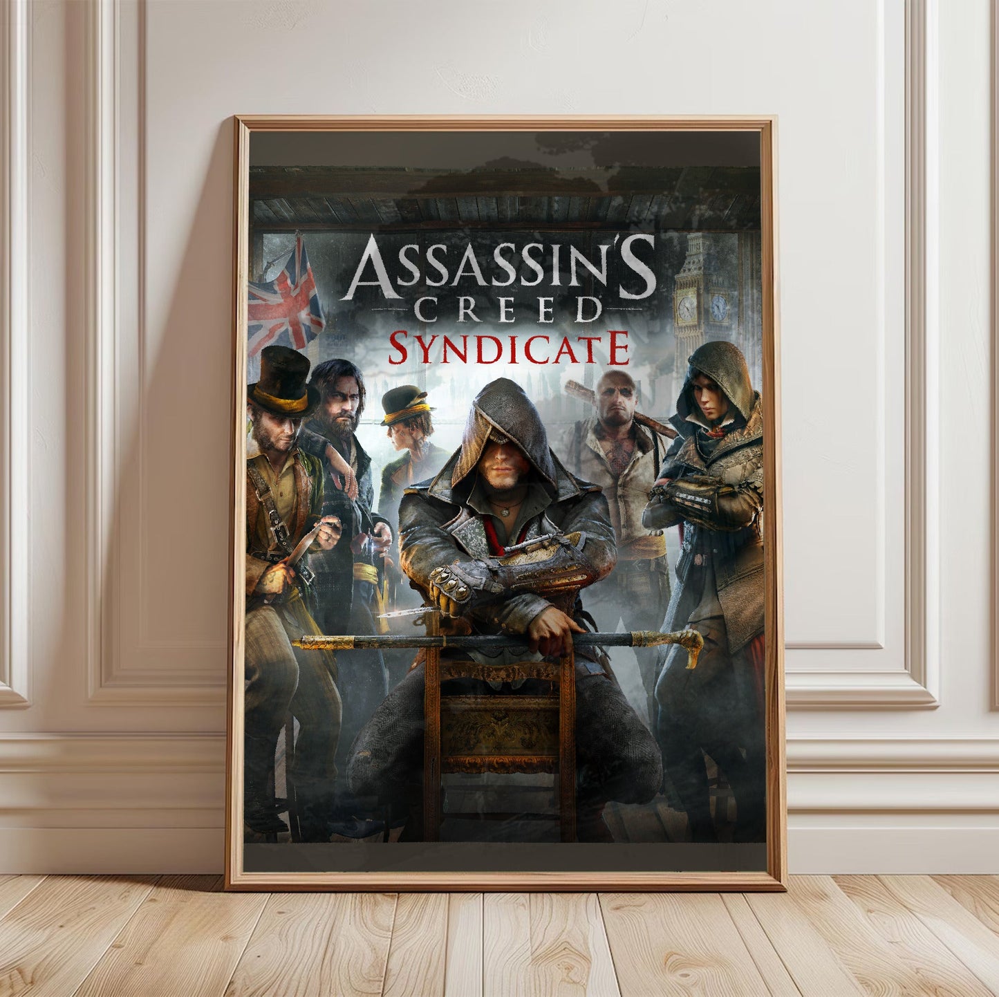 Assassin's Creed Syndicate cover art with logo in a light oak frame leaning against a white wall