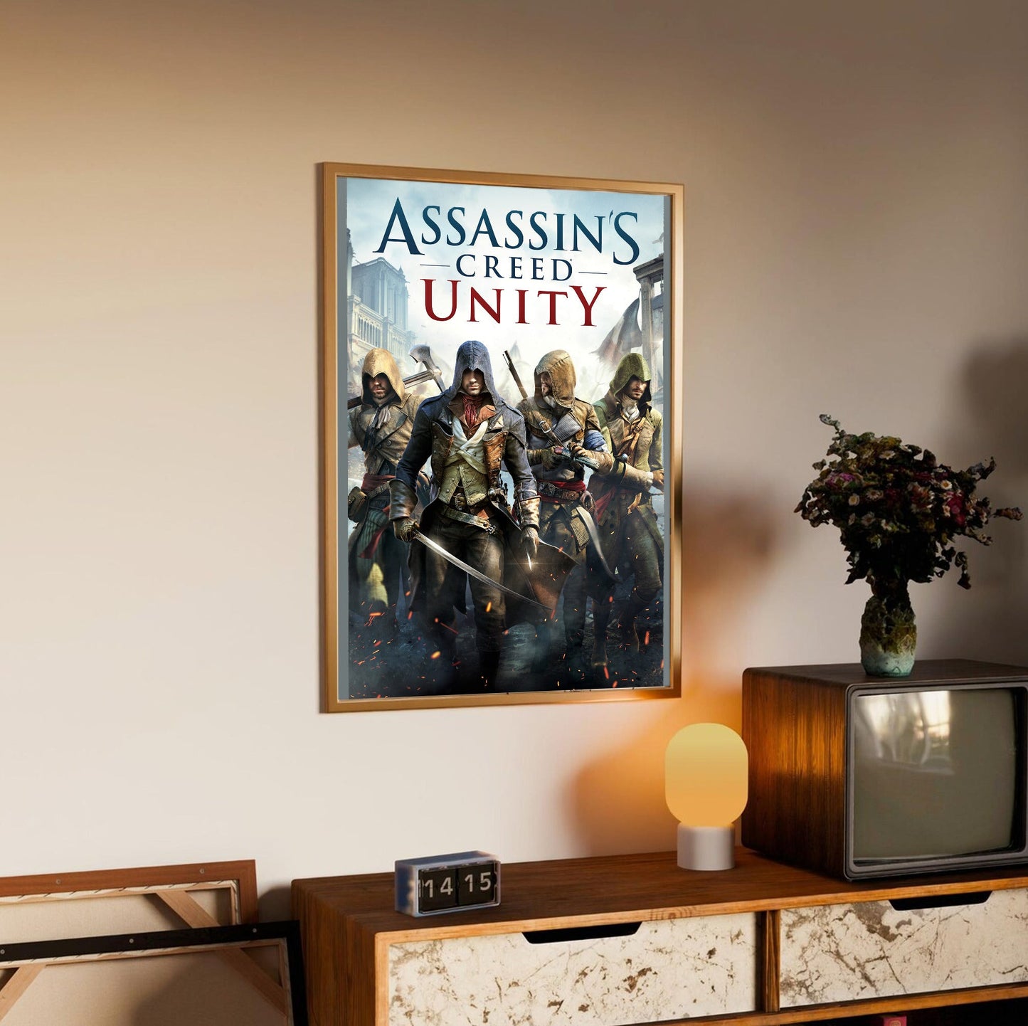Assassin's Creed Unity cover art in an oak frame above a sideboard