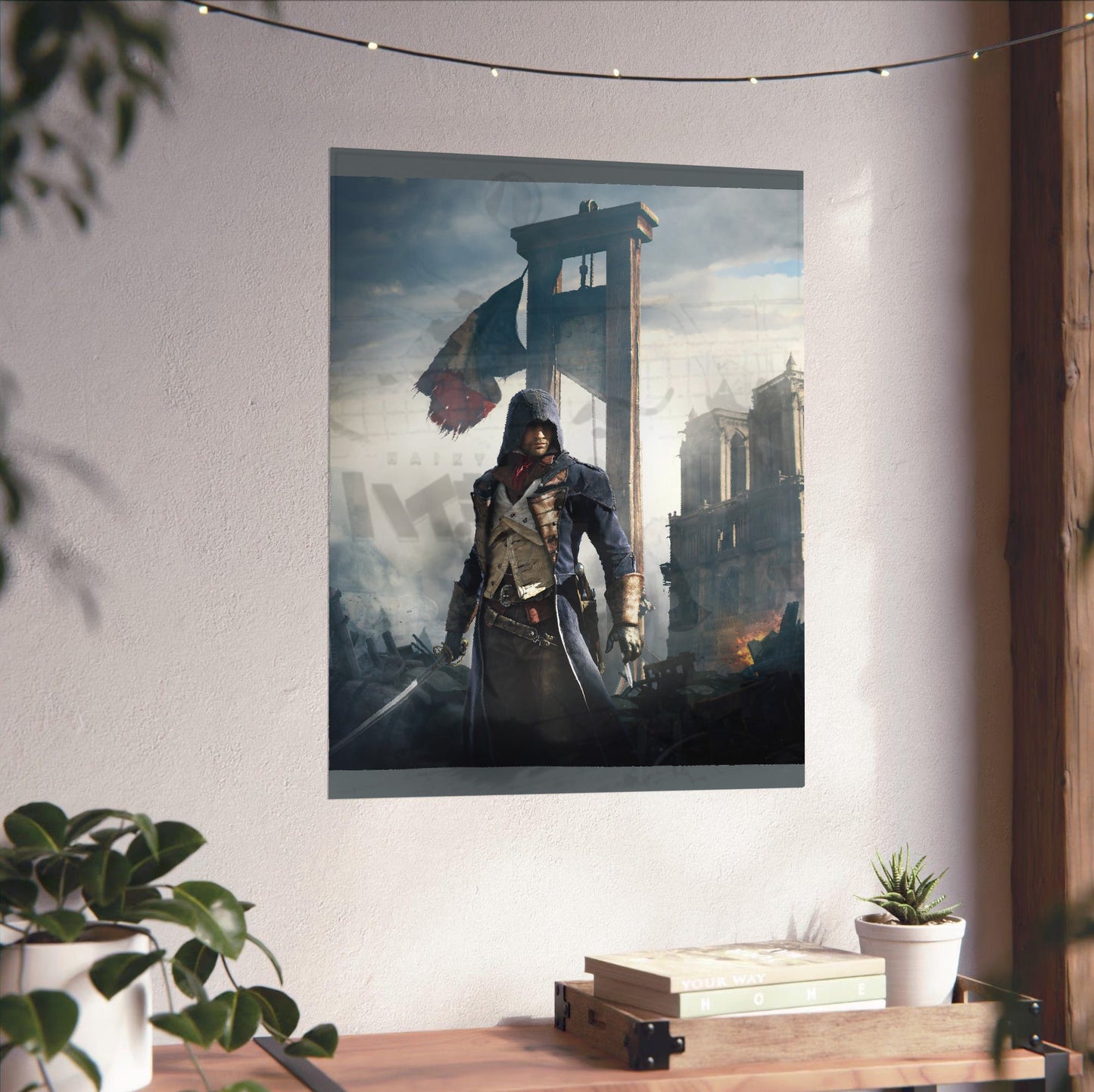 Assassin's Creed Unity alternative key art unframed on a white wall above a desk