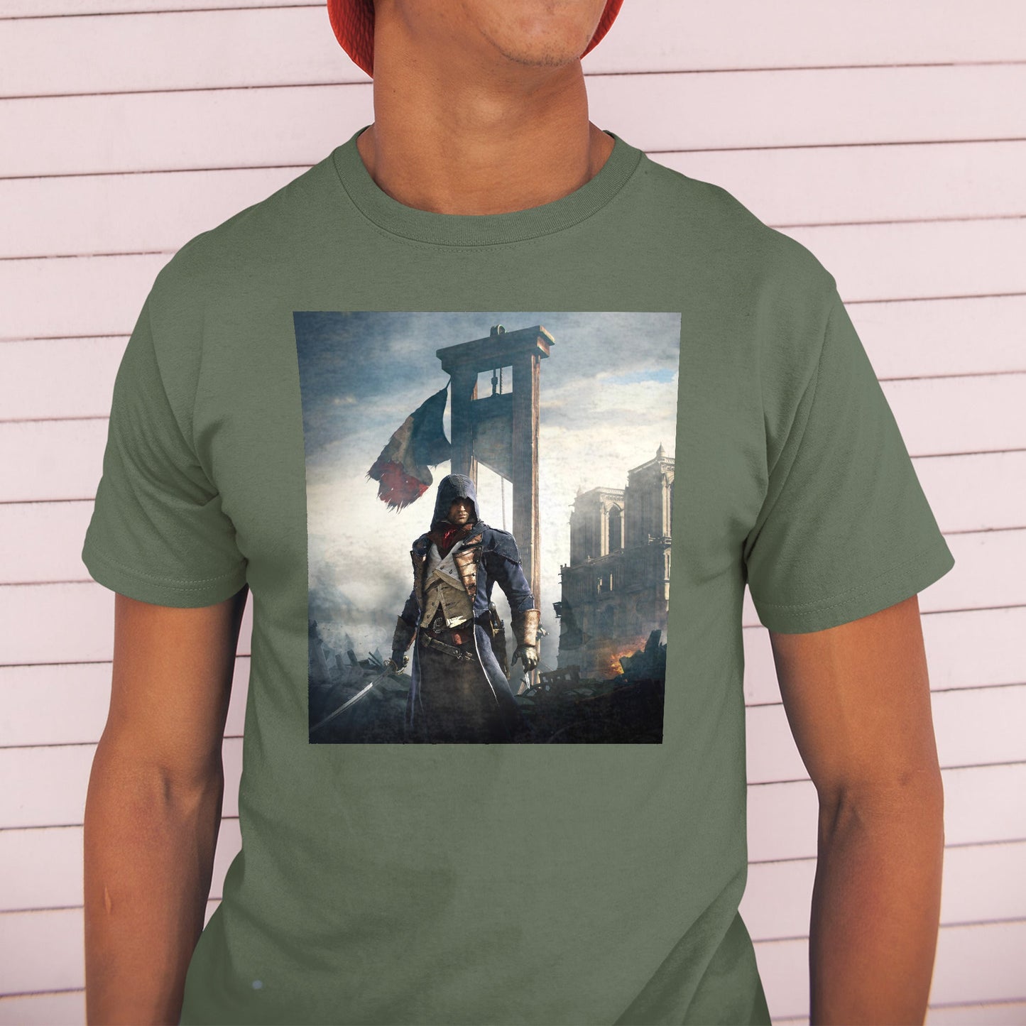 Assassin's Creed Unity alternate key art tee worn by a model in a cap, green