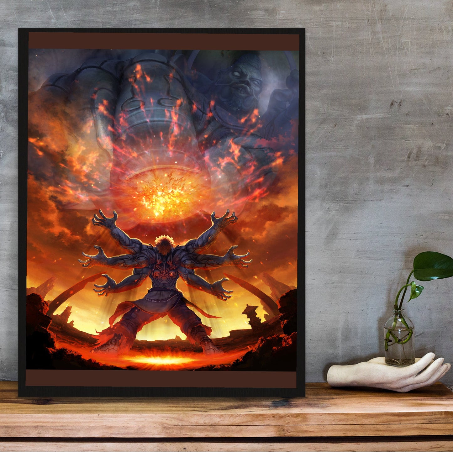 Asura's Wrath E3 artwork in a black frame on a wooden shelf against concrete