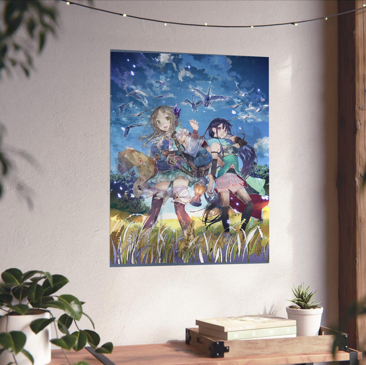 Atelier Firis The Alchemist and the Mysterious Journey Official Key Art unframed on a white wall above a desk