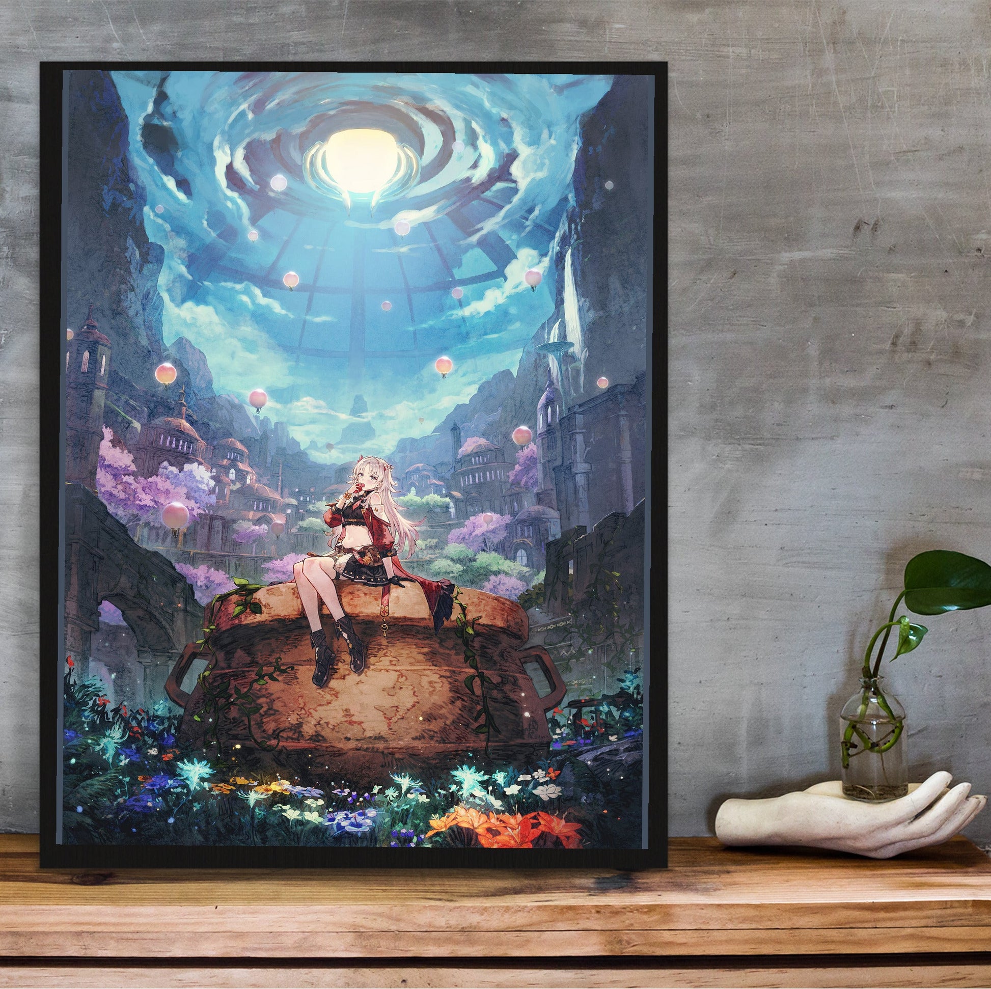 Atelier Karia The Night Kingdom and the Guide of Memories Official Key Art in a black frame on a wooden shelf against concrete