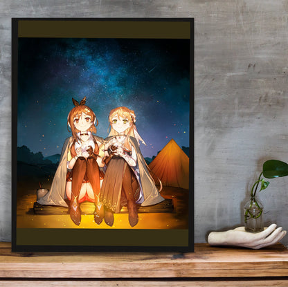 Atelier Ryza 3 Ryza and Klaudia Illustration in a black frame on a wooden shelf against concrete