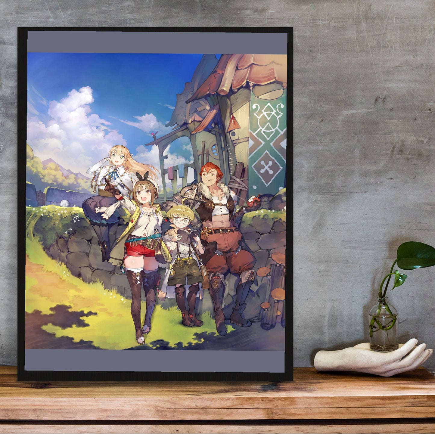 Atelier Ryza Ever Darkness and the Secret Hideout Official Key Art in a black frame on a wooden shelf against concrete