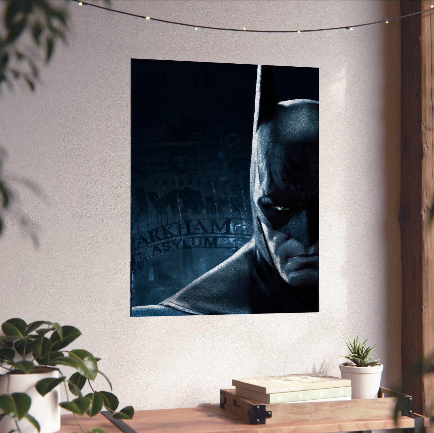 Batman Arkham Asylum Batman promo art poster unframed on a white wall above a desk
