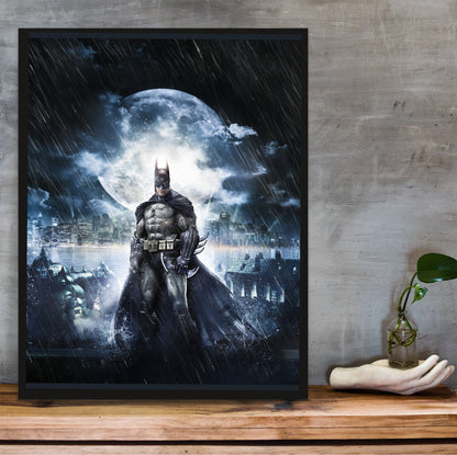 Batman Arkham Asylum official cover art poster in a black frame on a wooden shelf against concrete