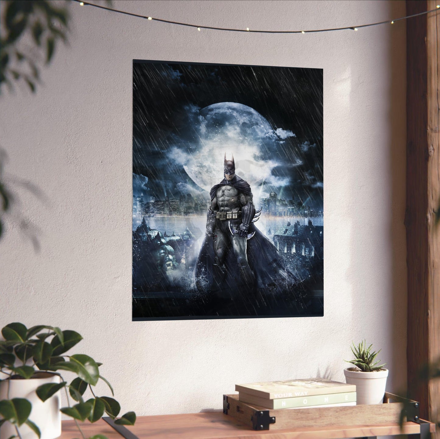 Batman Arkham Asylum official cover art poster unframed on a white wall above a desk