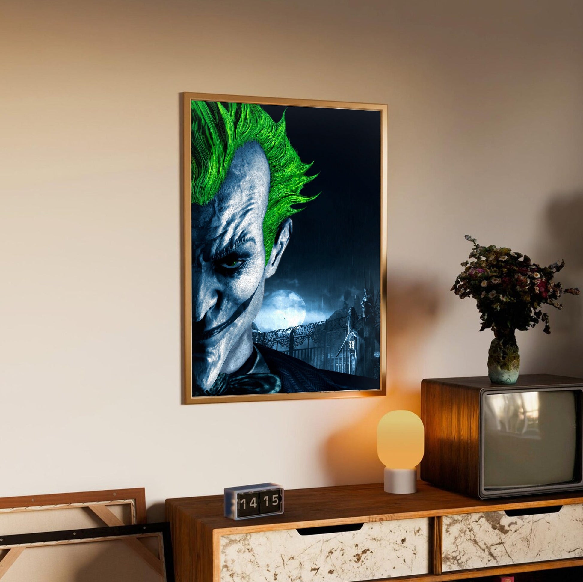 Batman Arkham Asylum Joker promo art poster in an oak frame above a sideboard