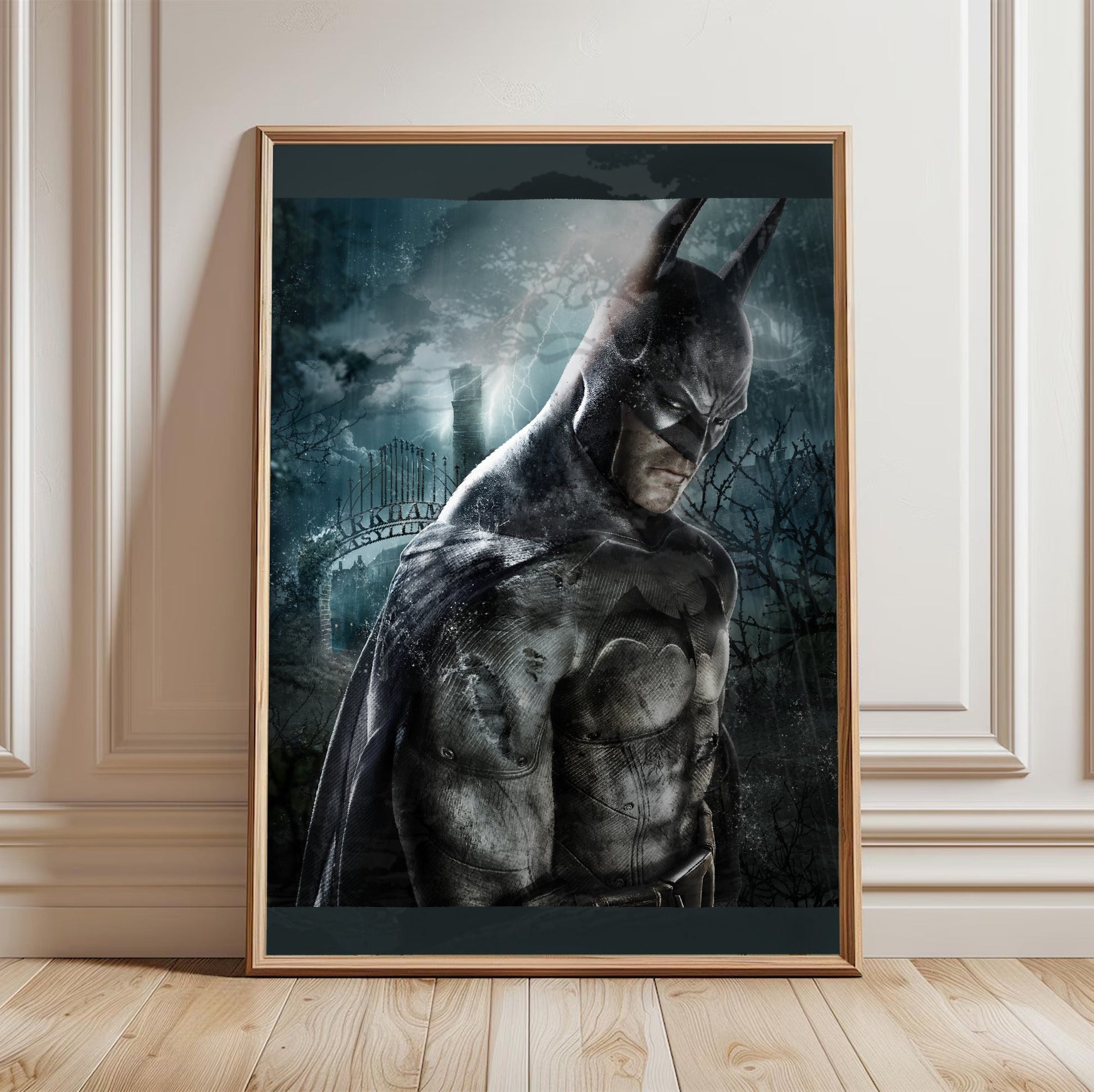 Batman Arkham Asylum official key art poster in a light oak frame leaning against a white wall