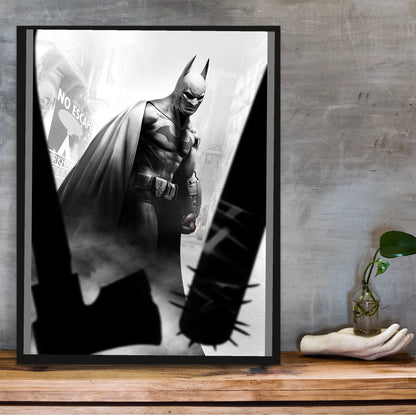 Batman Arkham City Batman vs thugs art poster in a black frame on a wooden shelf against concrete