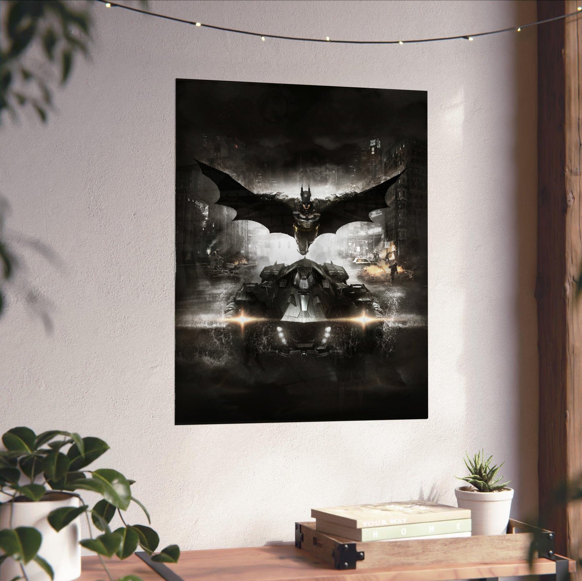 Batman Arkham Knight Batman and Batmobile key art poster unframed on a white wall above a desk