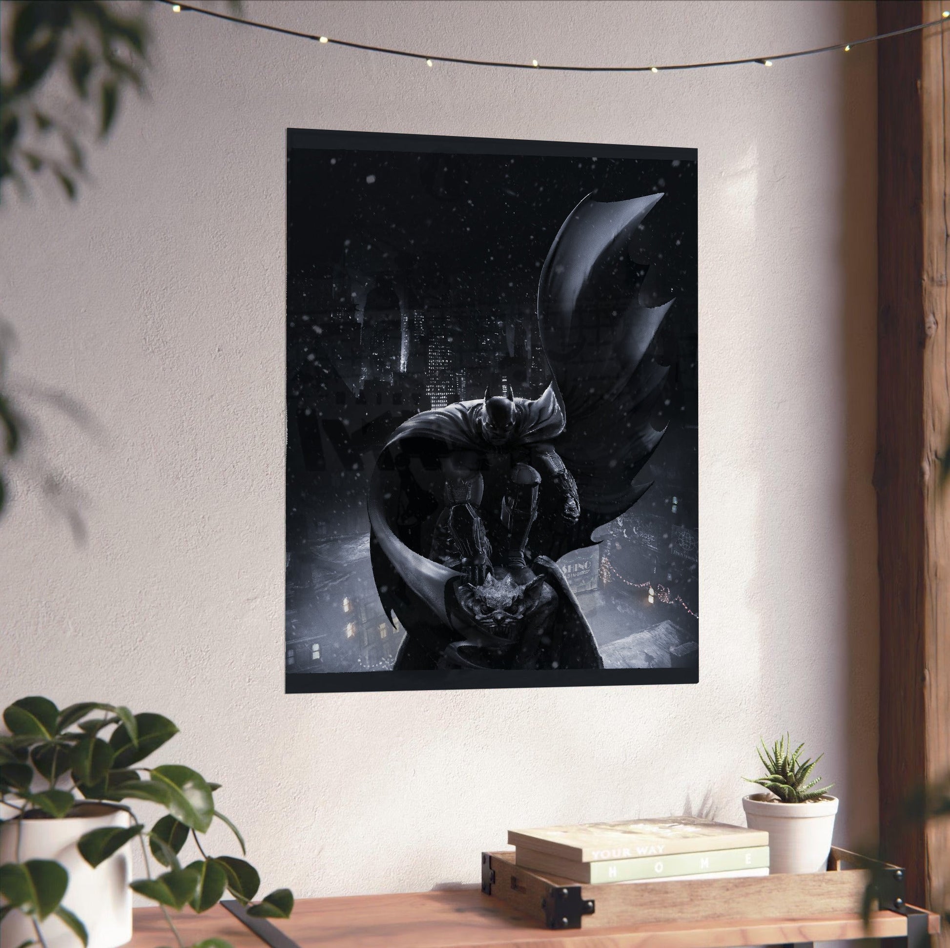 Batman Arkham Origins Batman key art poster unframed on a white wall above a desk