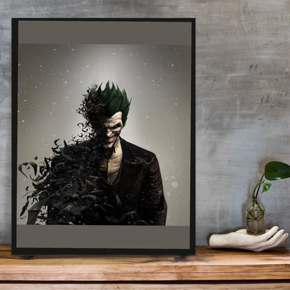 Batman Arkham Origins Joker promo art poster in a black frame on a wooden shelf against concrete