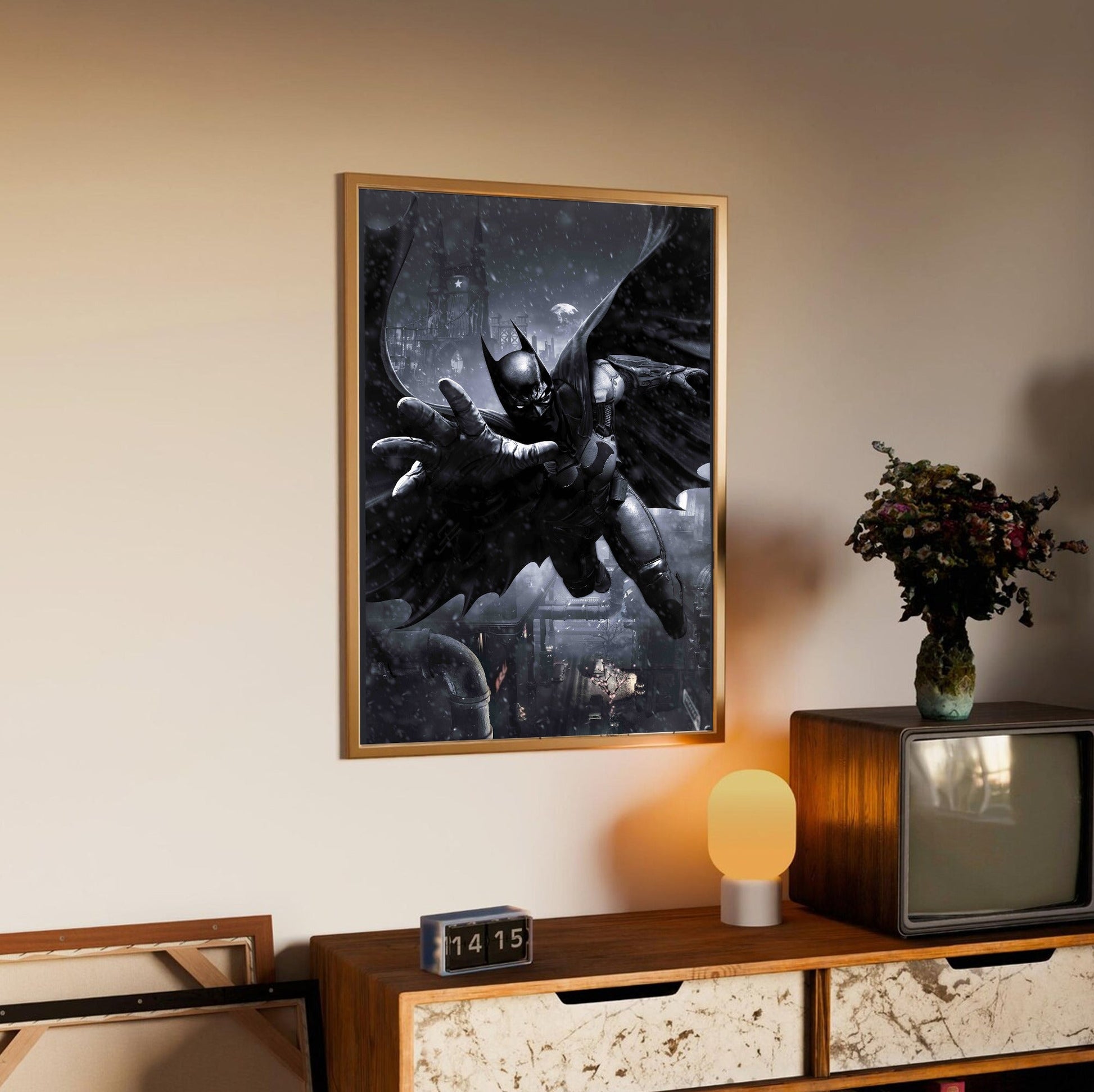 Batman Arkham Origins Batman gliding promo art poster in an oak frame above a sideboard
