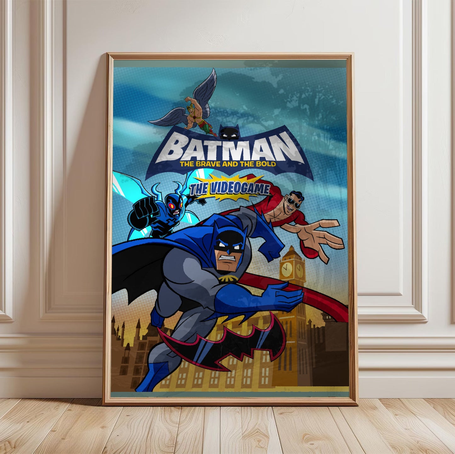 Batman The Brave and the Bold videogame cover art with logo poster in a light oak frame leaning against a white wall