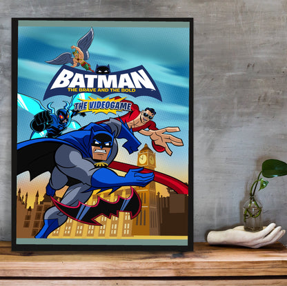Batman The Brave and the Bold videogame cover art with logo poster in a black frame on a wooden shelf against concrete