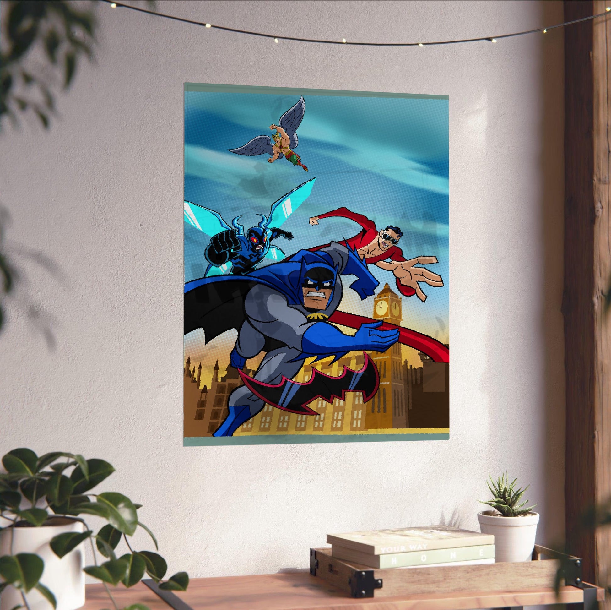 Batman The Brave and the Bold videogame cover art poster unframed on a white wall above a desk