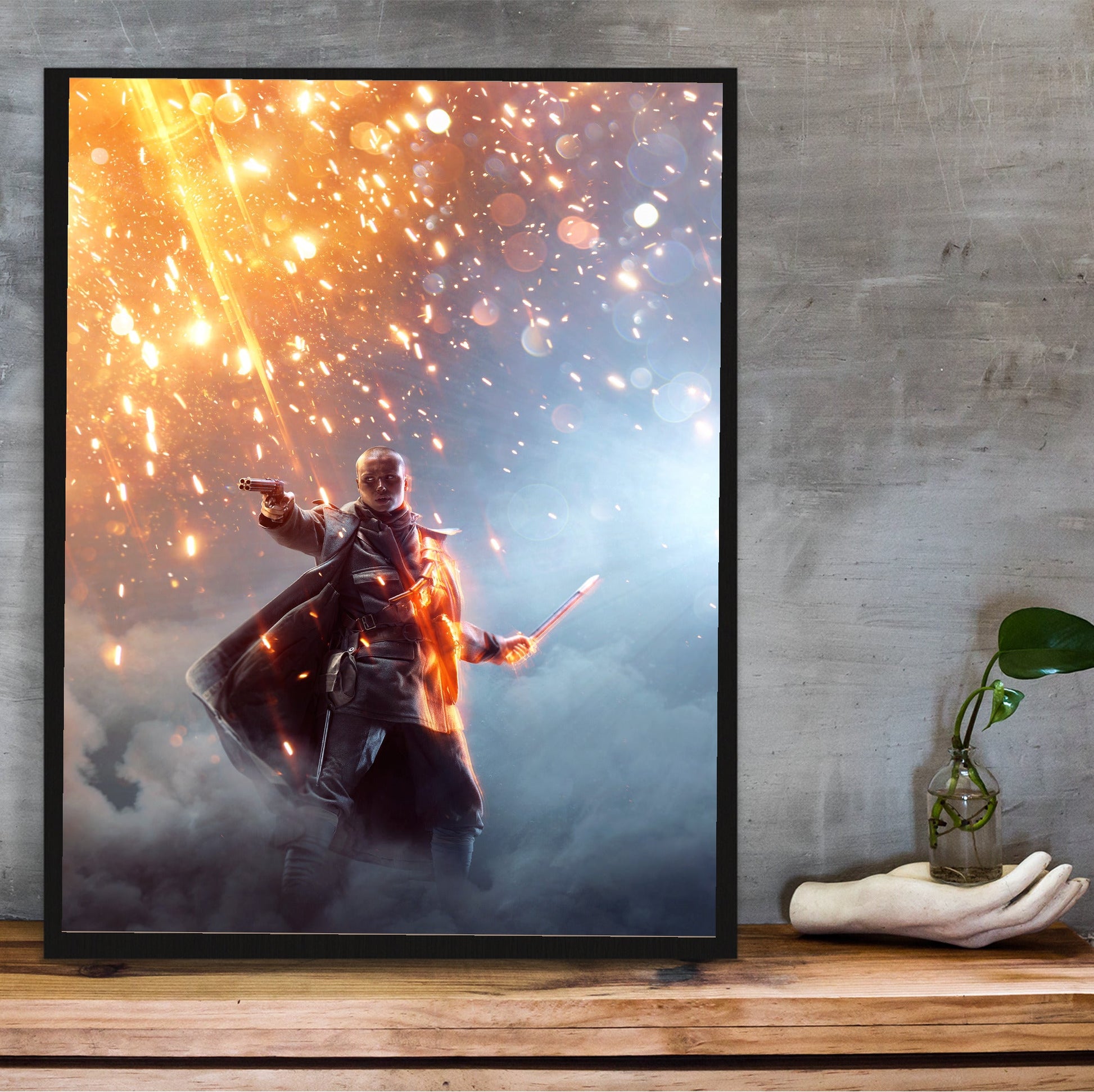 Battlefield 1 Revolution Edition key art poster in a black frame on a wooden shelf against concrete