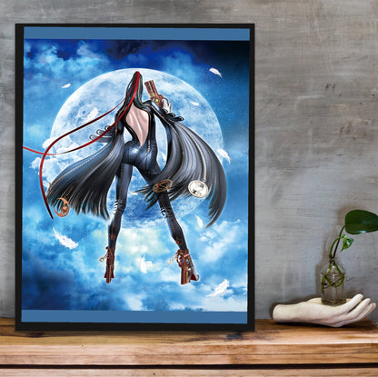 Bayonetta moonlight key art poster in a black frame on a wooden shelf against concrete