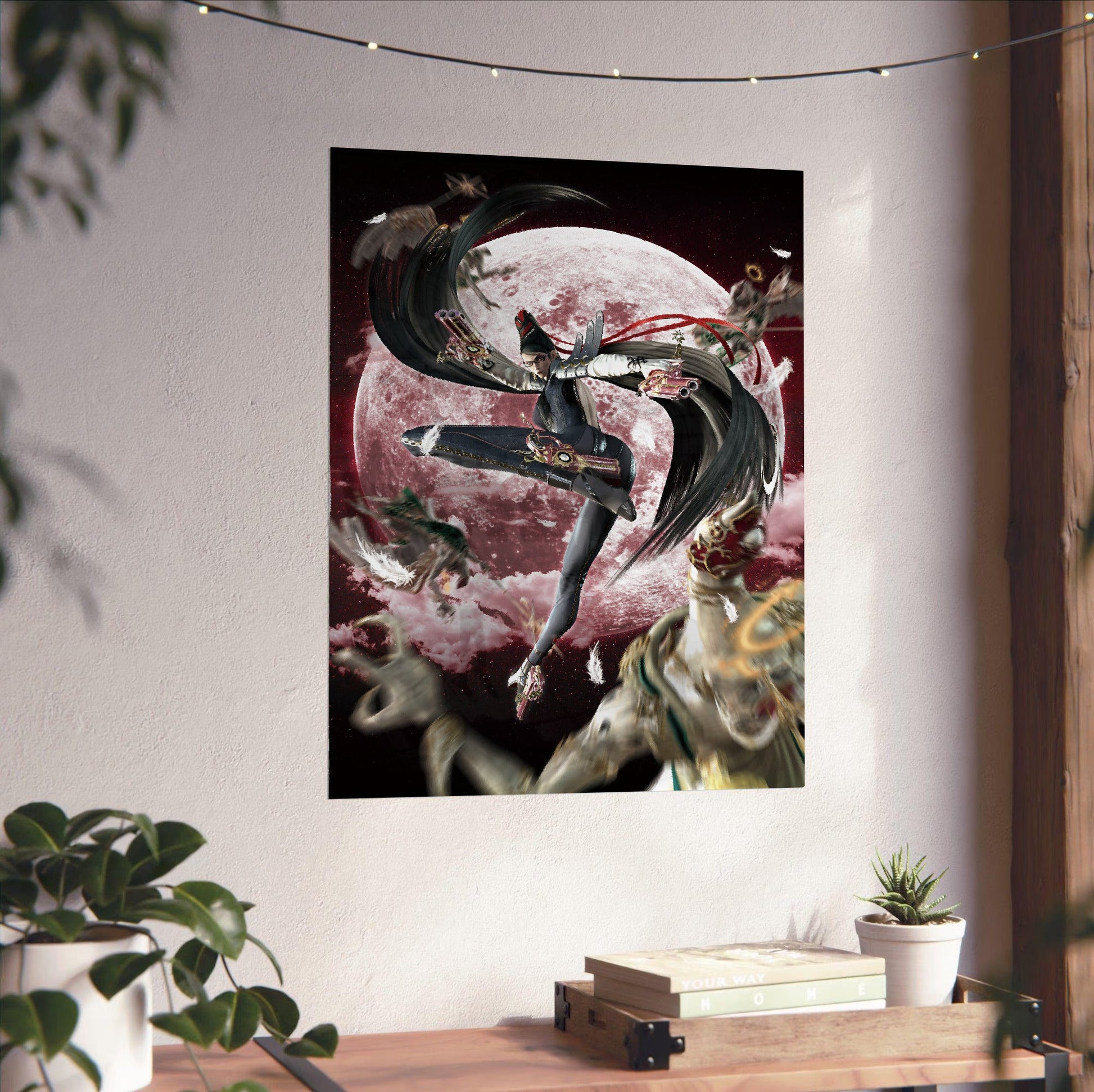 Bayonetta crimson moon key artwork poster unframed on a white wall above a desk