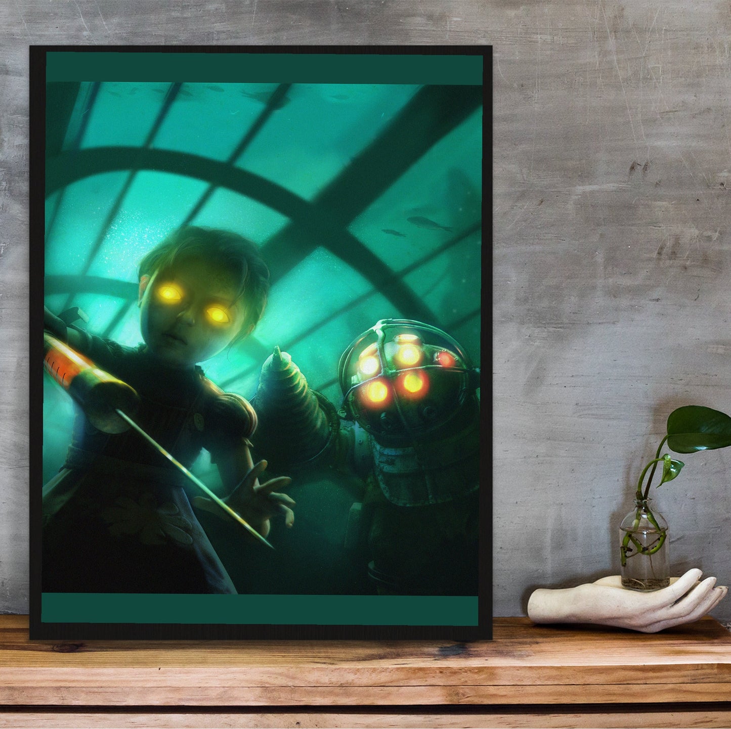 BioShock PS3 cover artwork poster hung above a desk