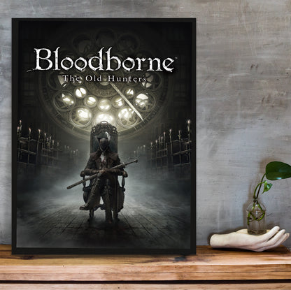 Bloodborne The Old Hunters poster hung above a desk