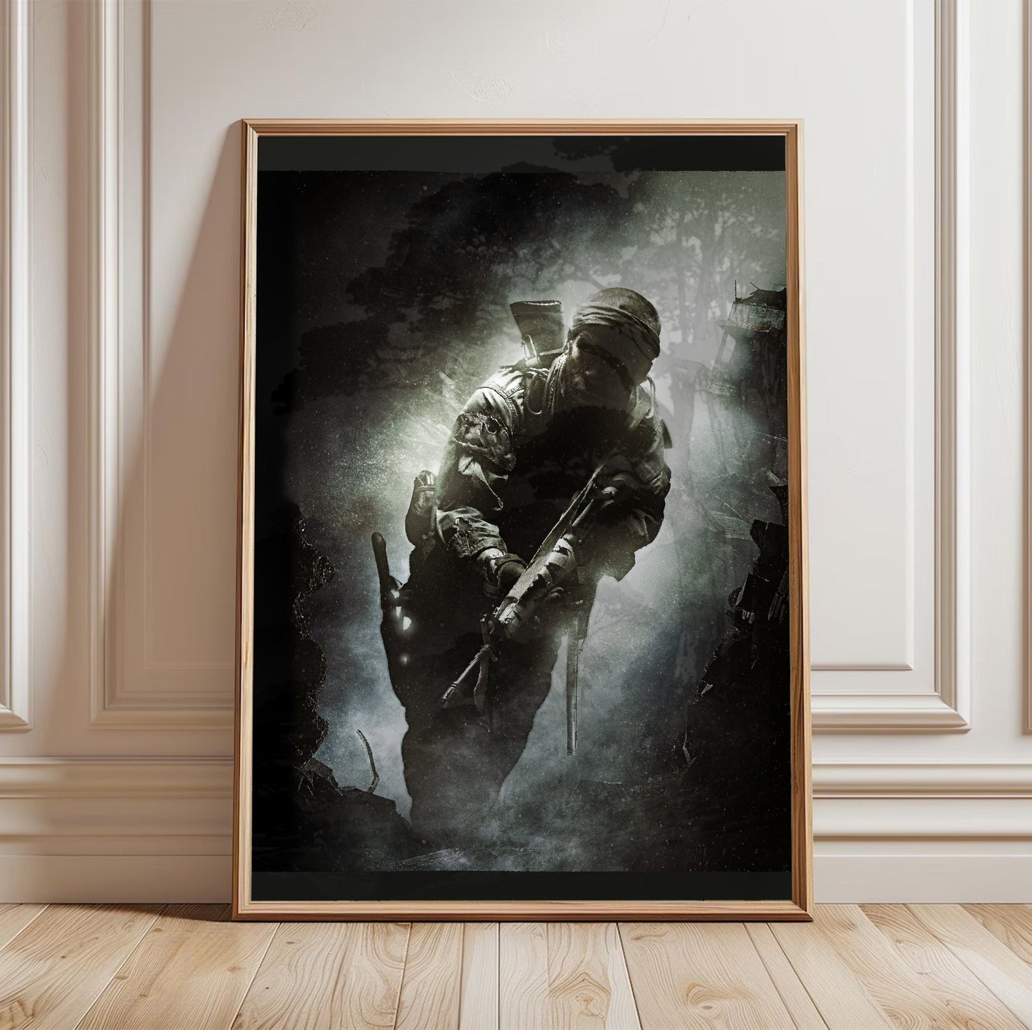 Call of Duty Black Ops key art in a light oak frame leaning against a white wall