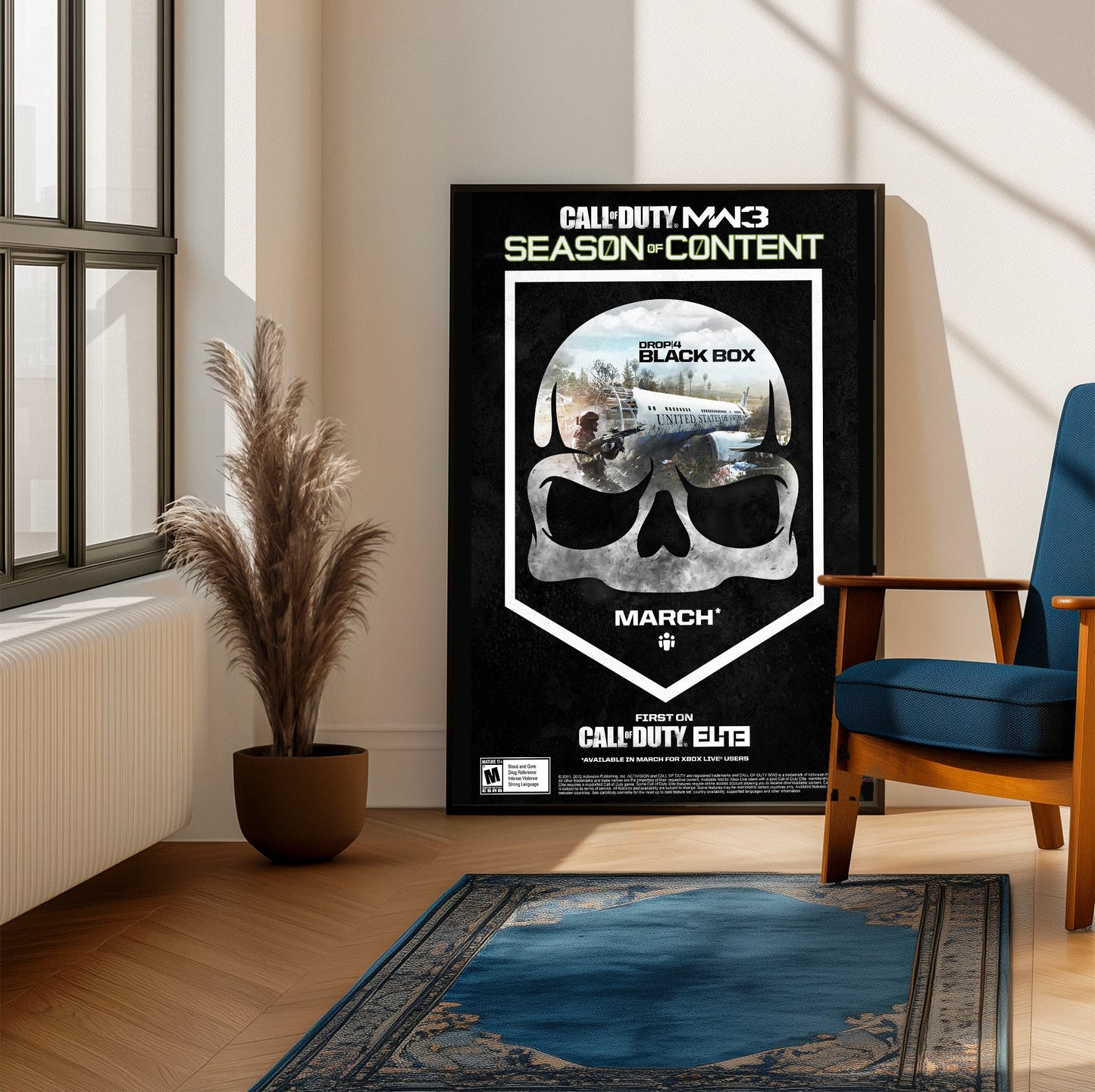 Call of Duty Modern Warfare 3 Black Box season art framed beside a blue armchair in a sunlit room
