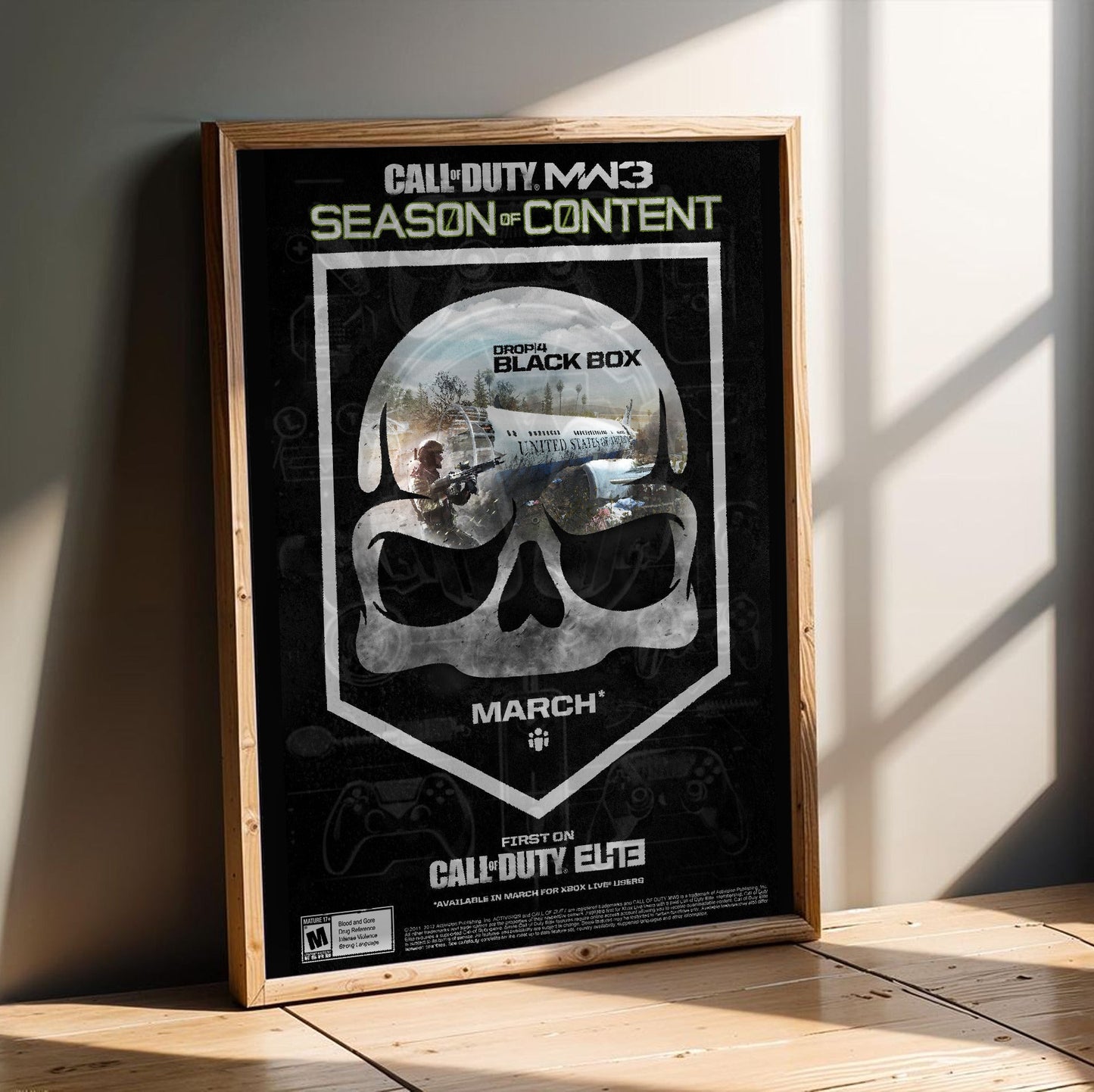 Call of Duty Modern Warfare 3 Black Box season art in an oak frame leaning on a wooden floor
