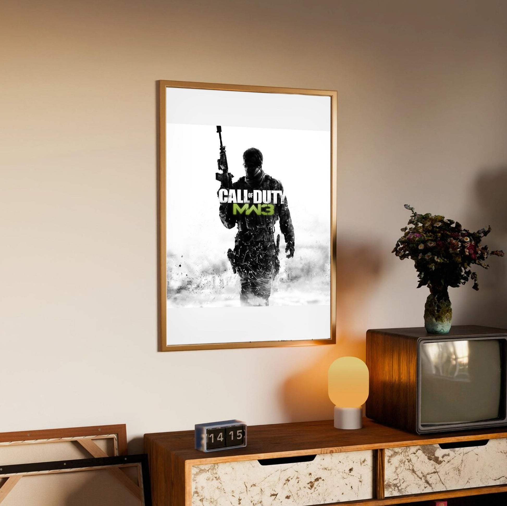 Call of Duty Modern Warfare 3 cover art with logo in an oak frame above a sideboard