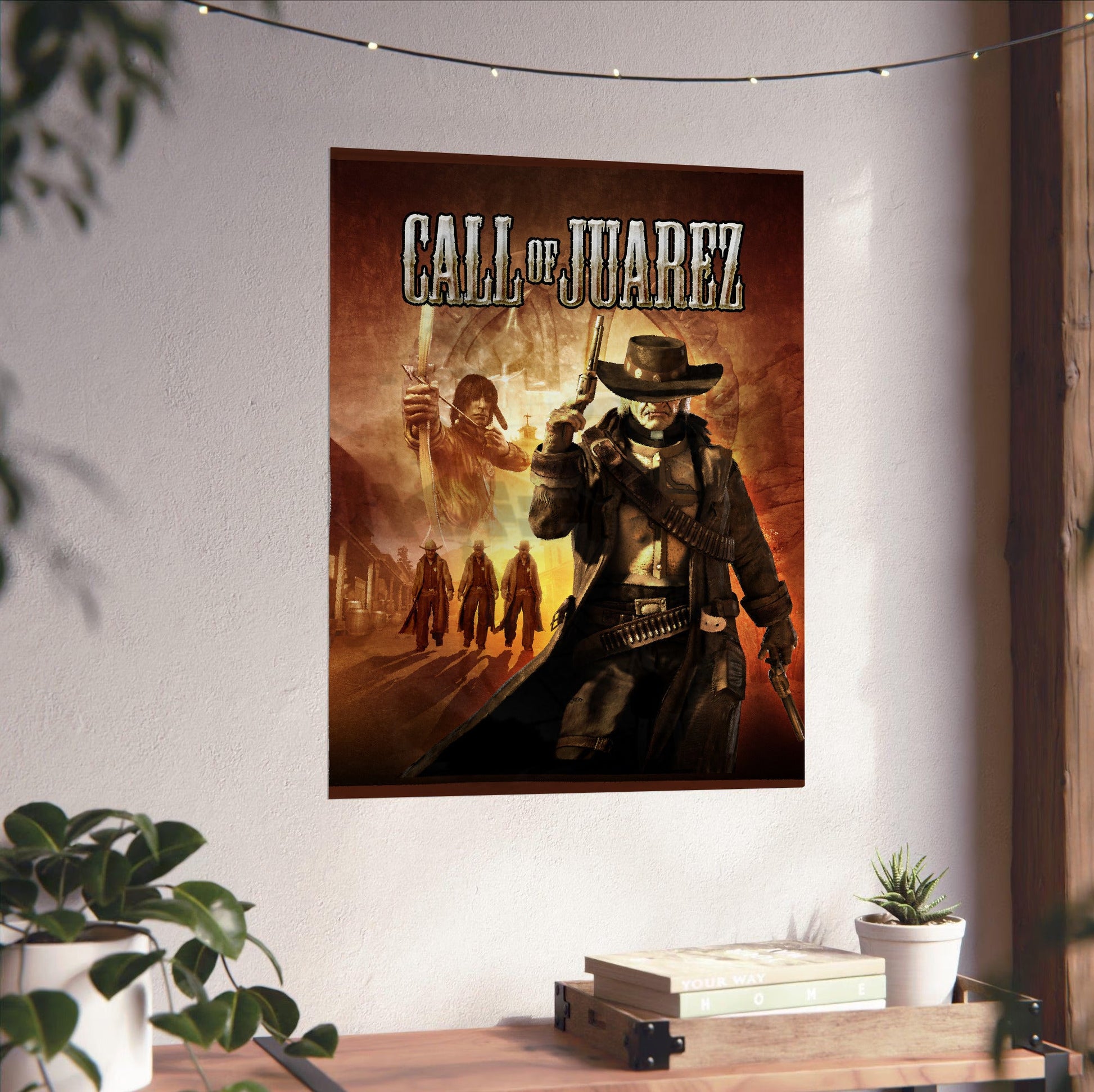 Call of Juarez cover art with logo unframed on a white wall above a desk