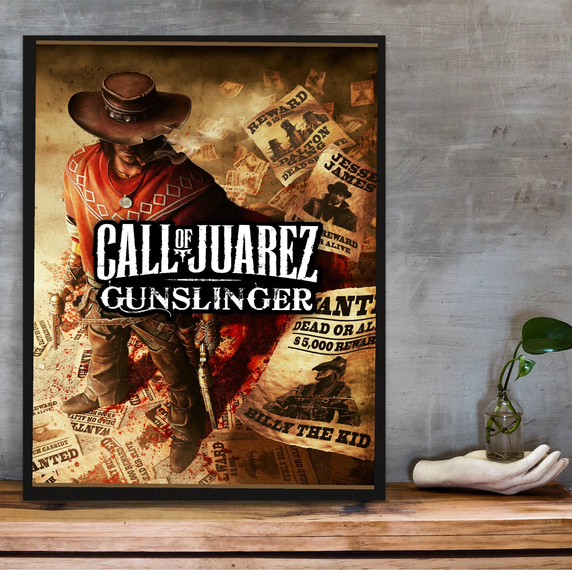 Call of Juarez Gunslinger alternate cover art in a black frame on a wooden shelf against concrete