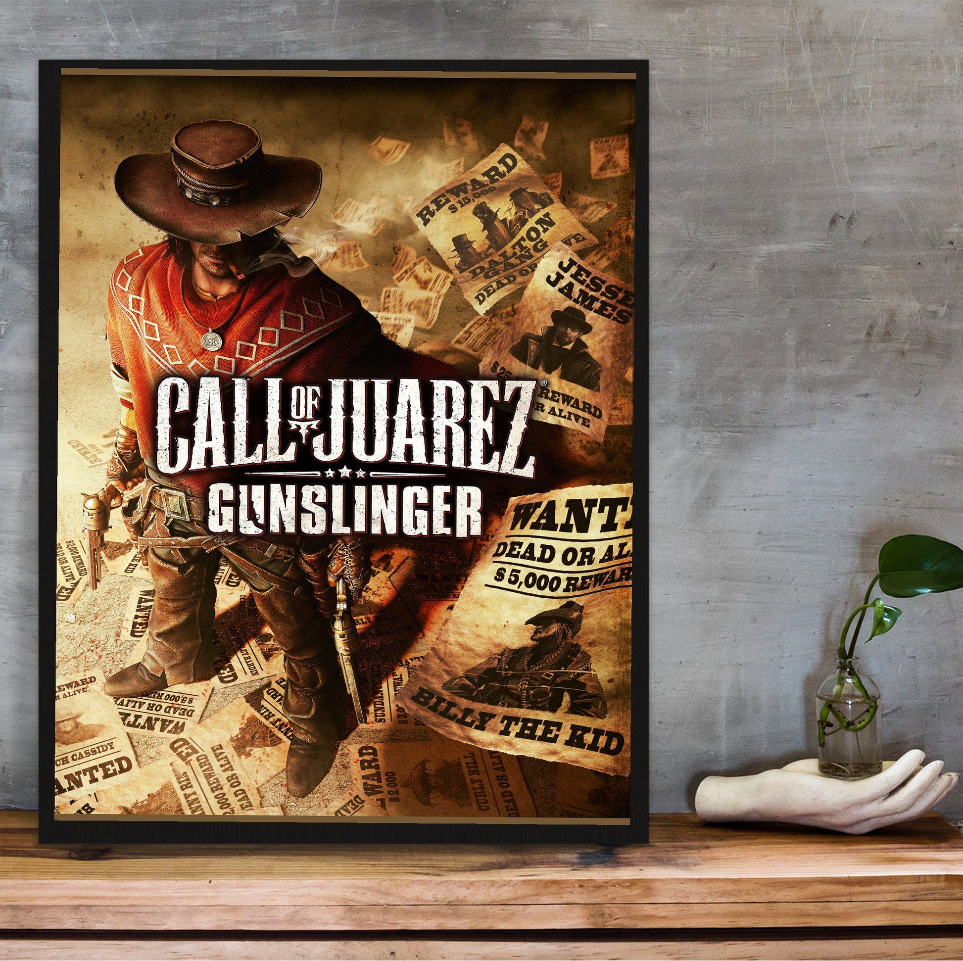 Call of Juarez Gunslinger cover art with logo in a black frame on a wooden shelf against concrete