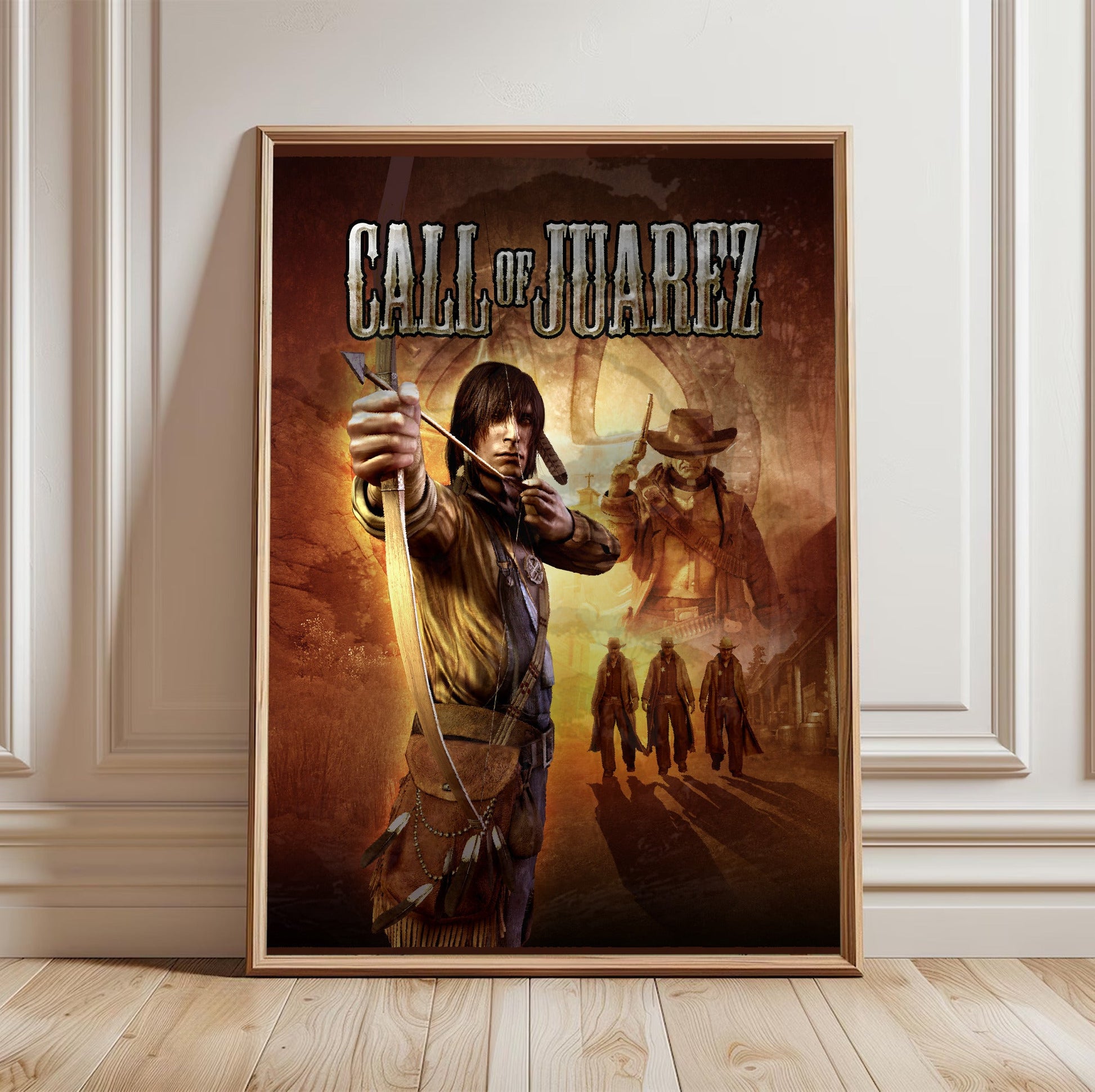 Call of Juarez key art with logo in a light oak frame leaning against a white wall